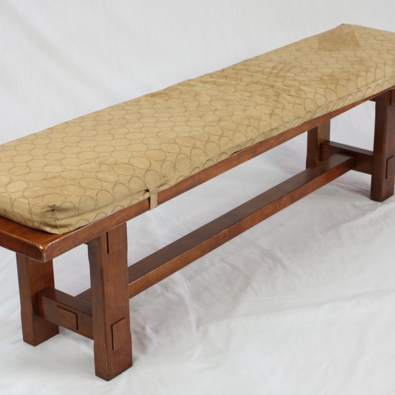 wood bench with cushions